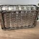 Woven silver-plated metal basket.