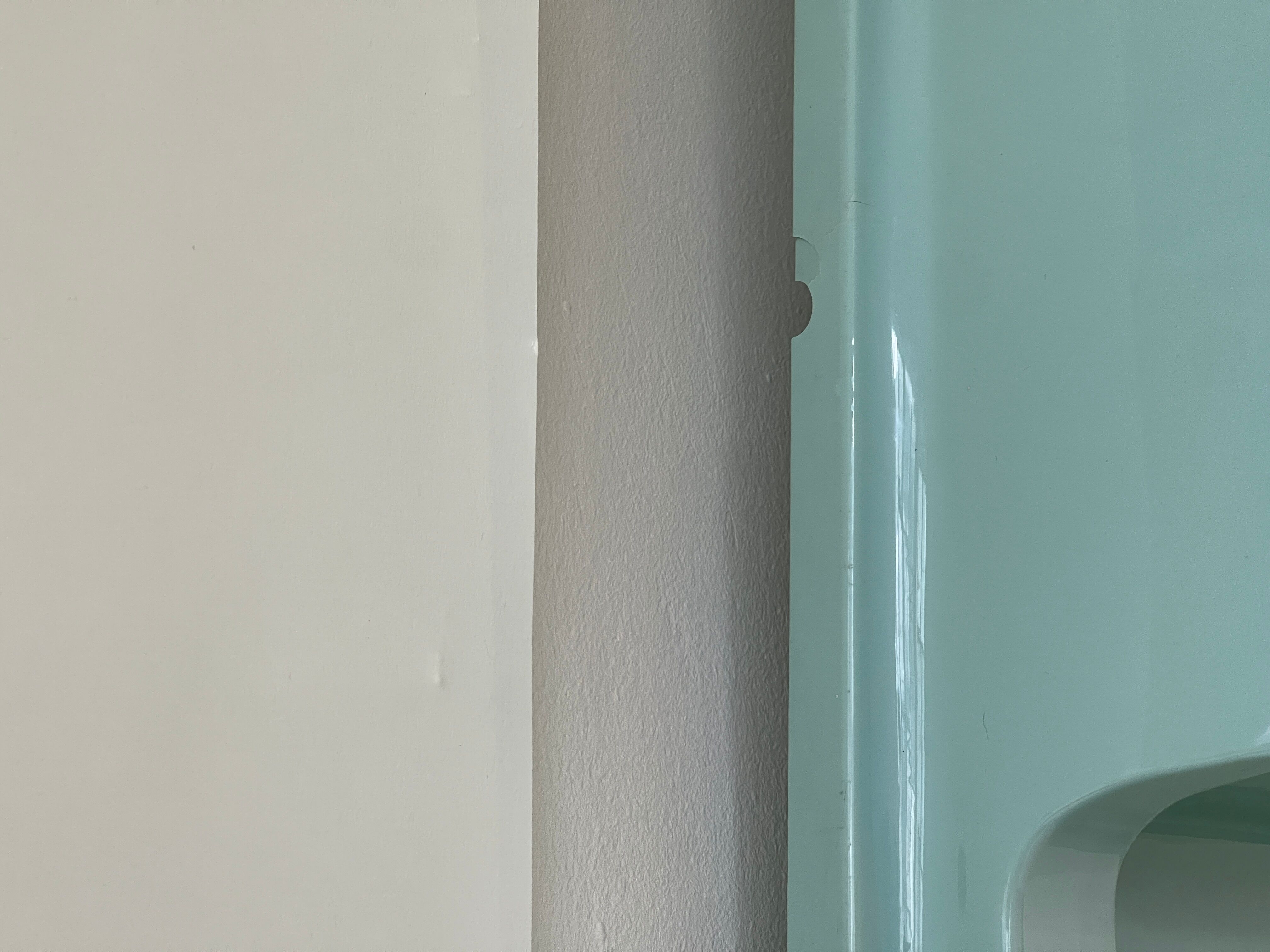 Baby blue plastic mirror and wash station