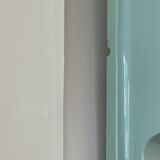 Baby blue plastic mirror and wash station