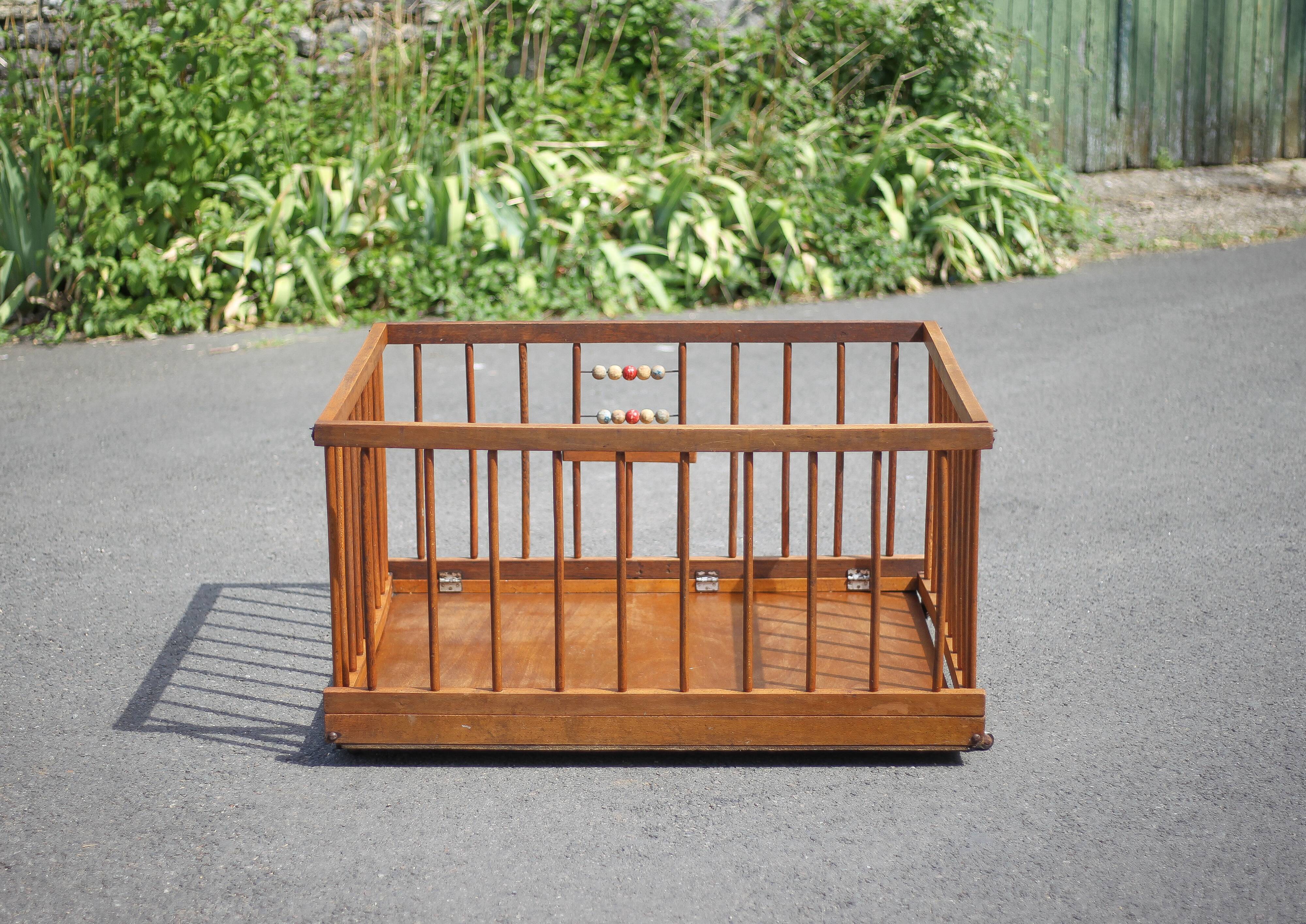 Folding wooden baby park on wheels, vintage park