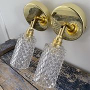 Pair of vintage electrified glass wall lamps
