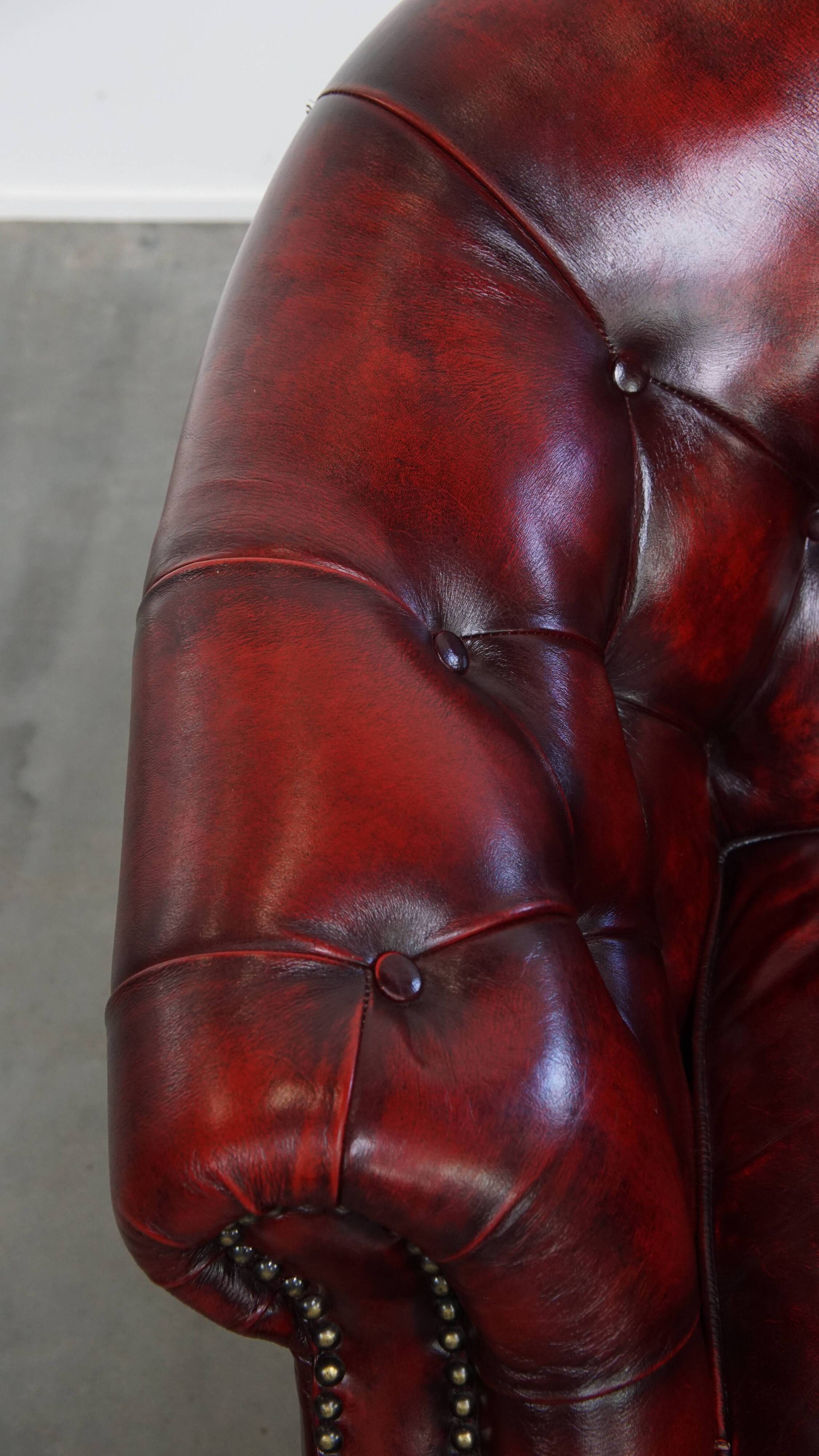 Set of a Red Cowhide Leather Chesterfield Club Chair and Side Table
