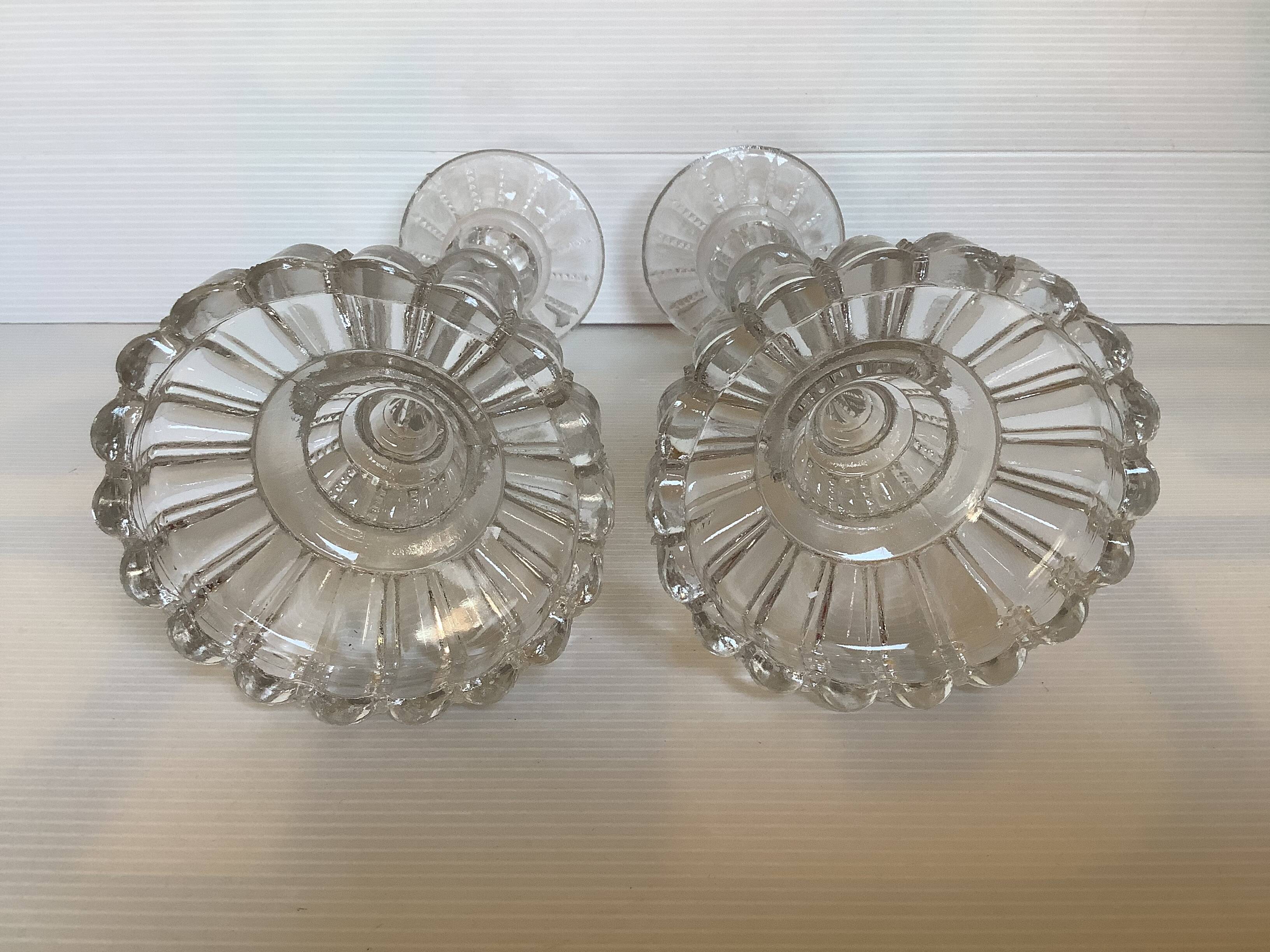 Pair of old twisted candlesticks with diamond tips.