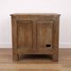 Oak side cabinet with carved motifs