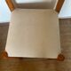 Vintage wooden chair with cream white corduroy seat
