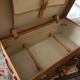 Former leather trunk with Louis Vuitton label holder