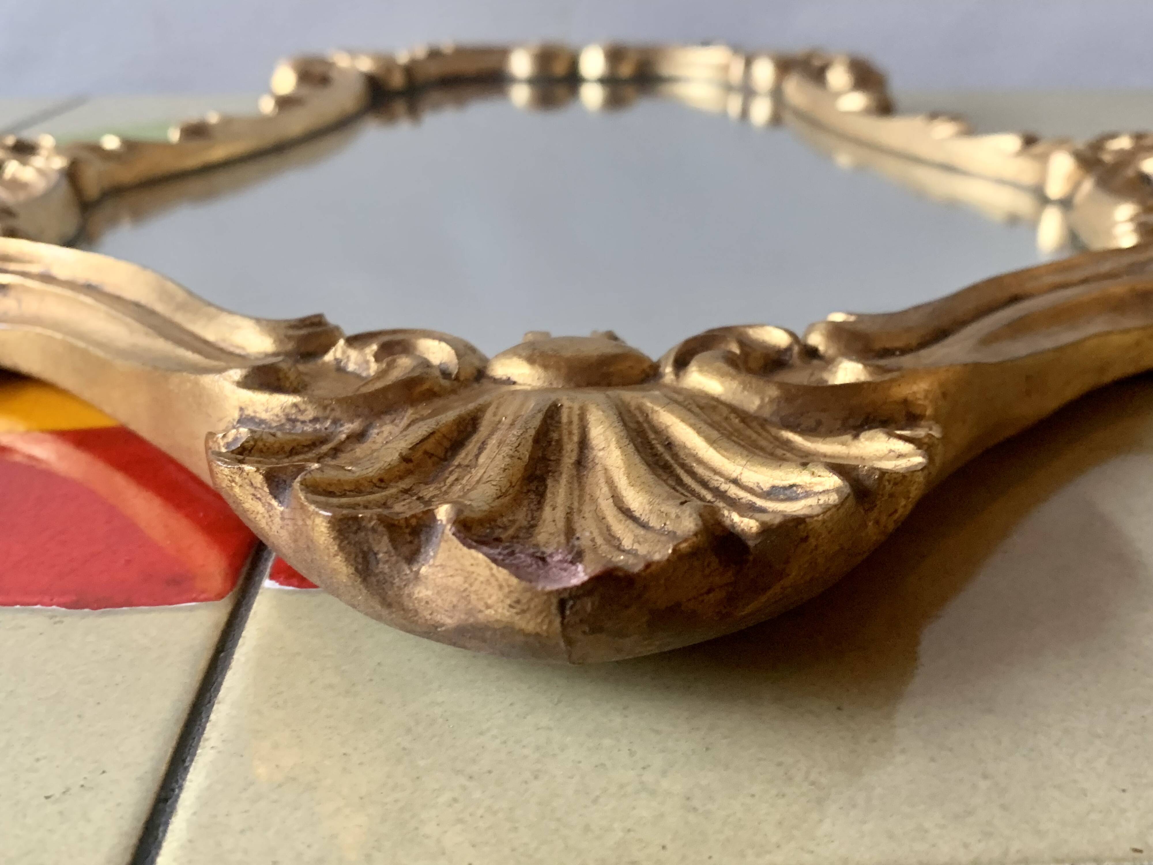 Vintage wall mirror in gold plaster - rococo style