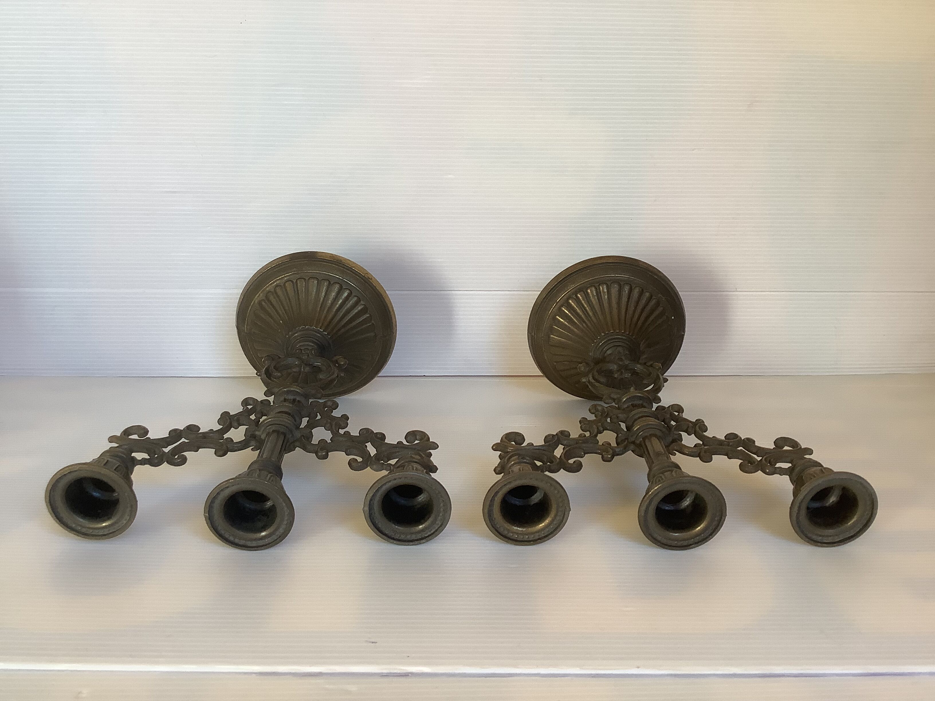 Pair of baroque brass candle holders
