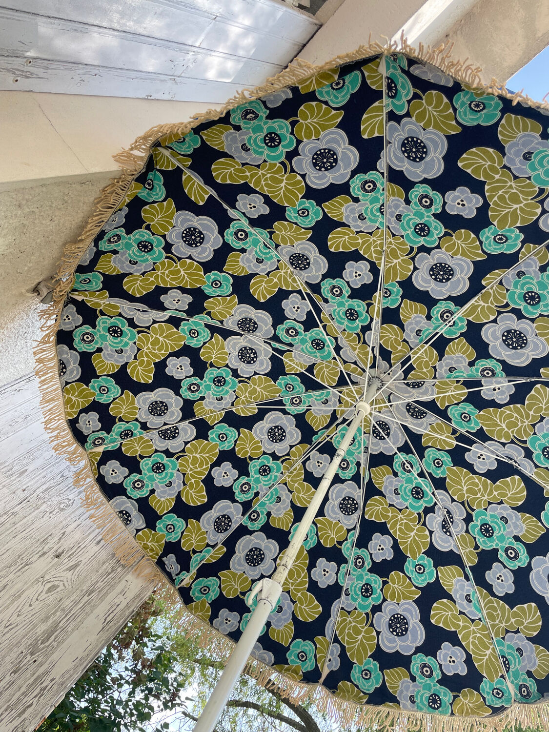 Blue parasol and flowers