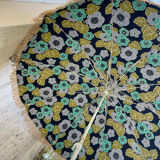 Blue parasol and flowers