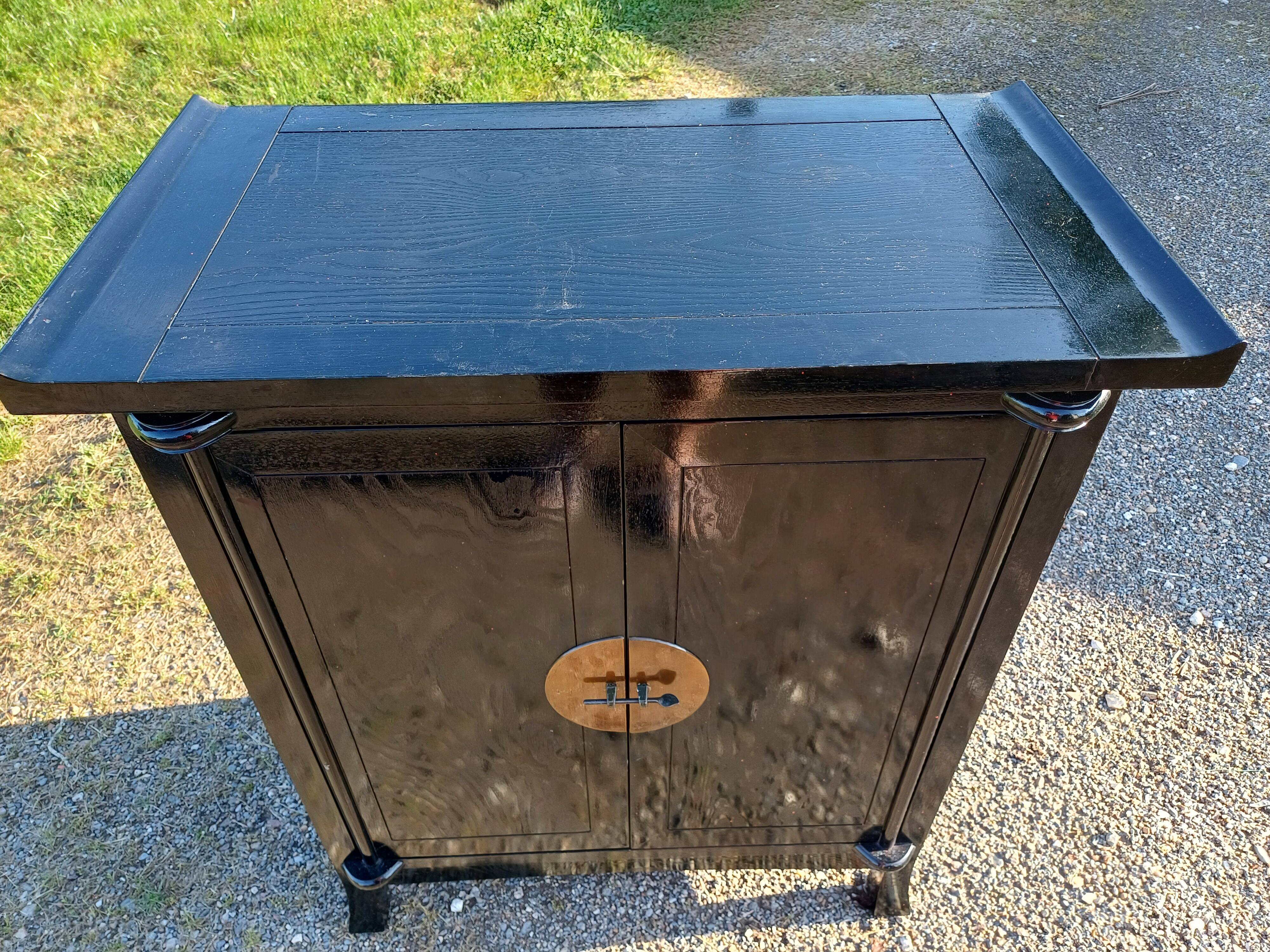 Asian blackened wood furniture