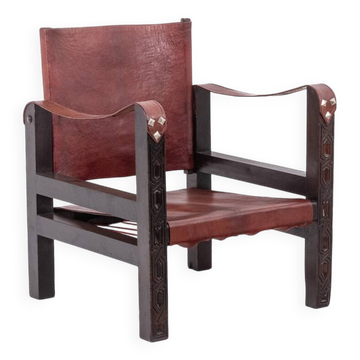 Fauteuil « Safari » en bois et cuir cognac. Années 1960/70.