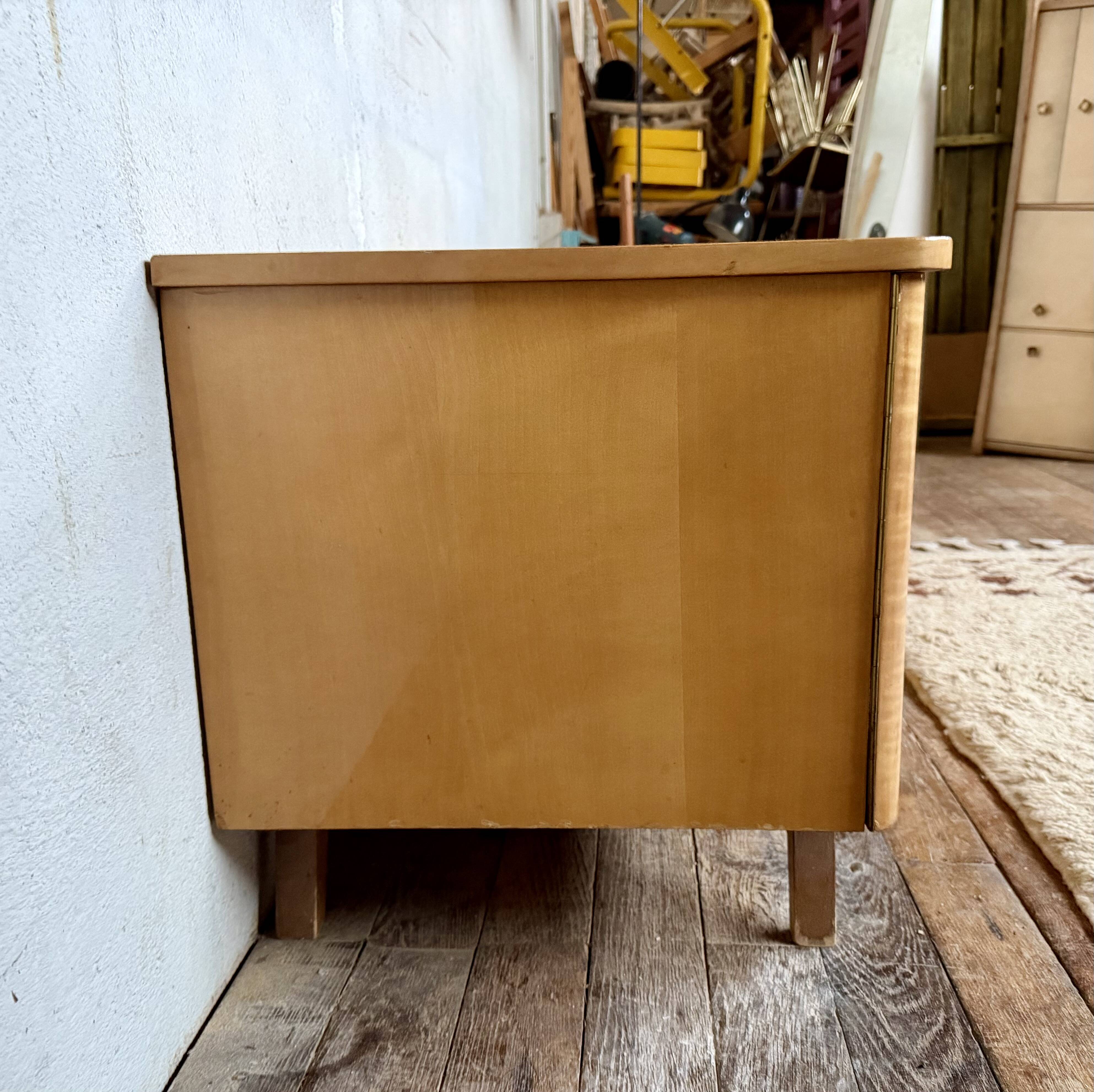 Vintage TV unit with tapered legs in Scandinavian style.
