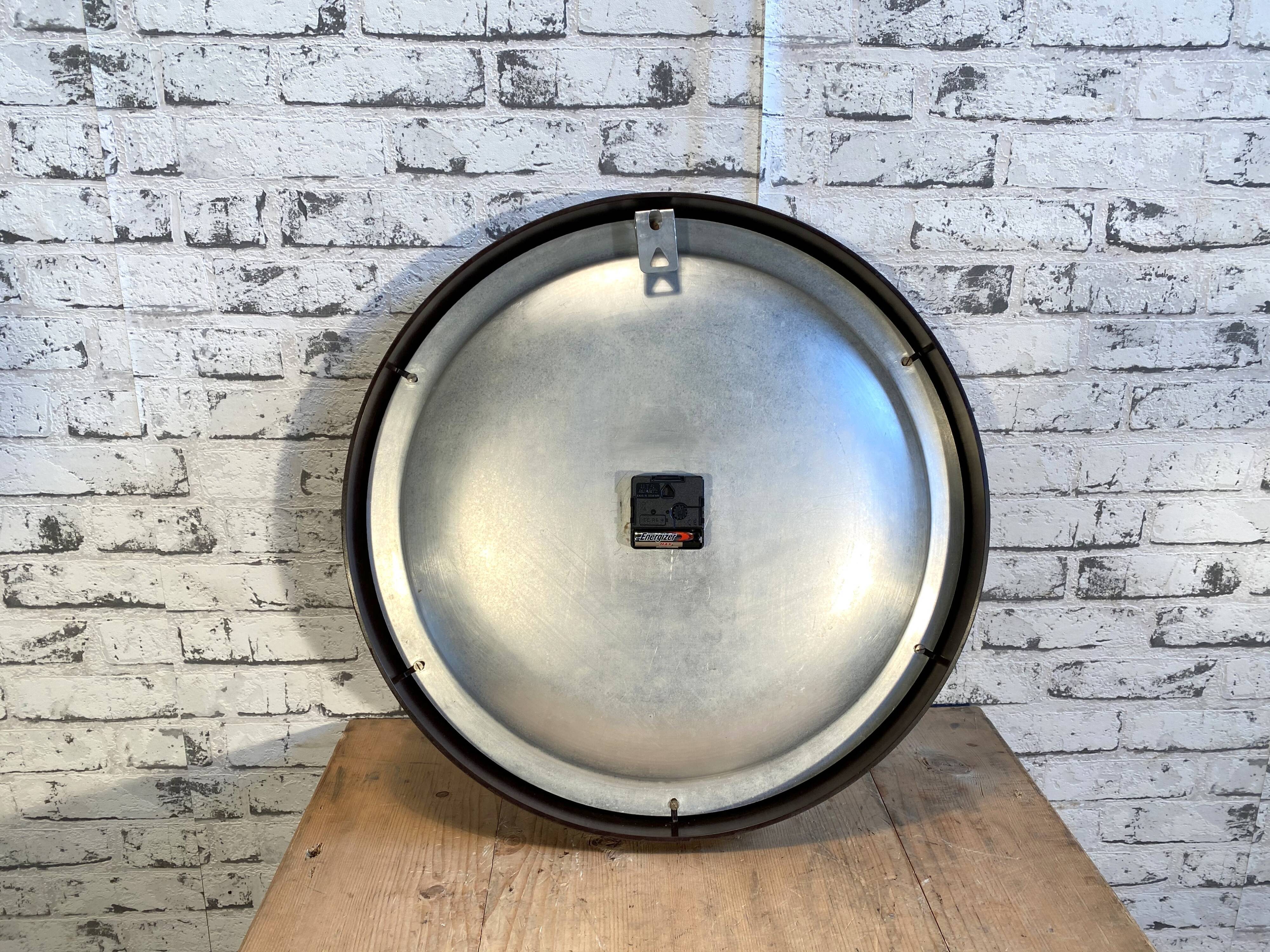 Industrial bakelite factory wall clock from Pragotron, 1960s