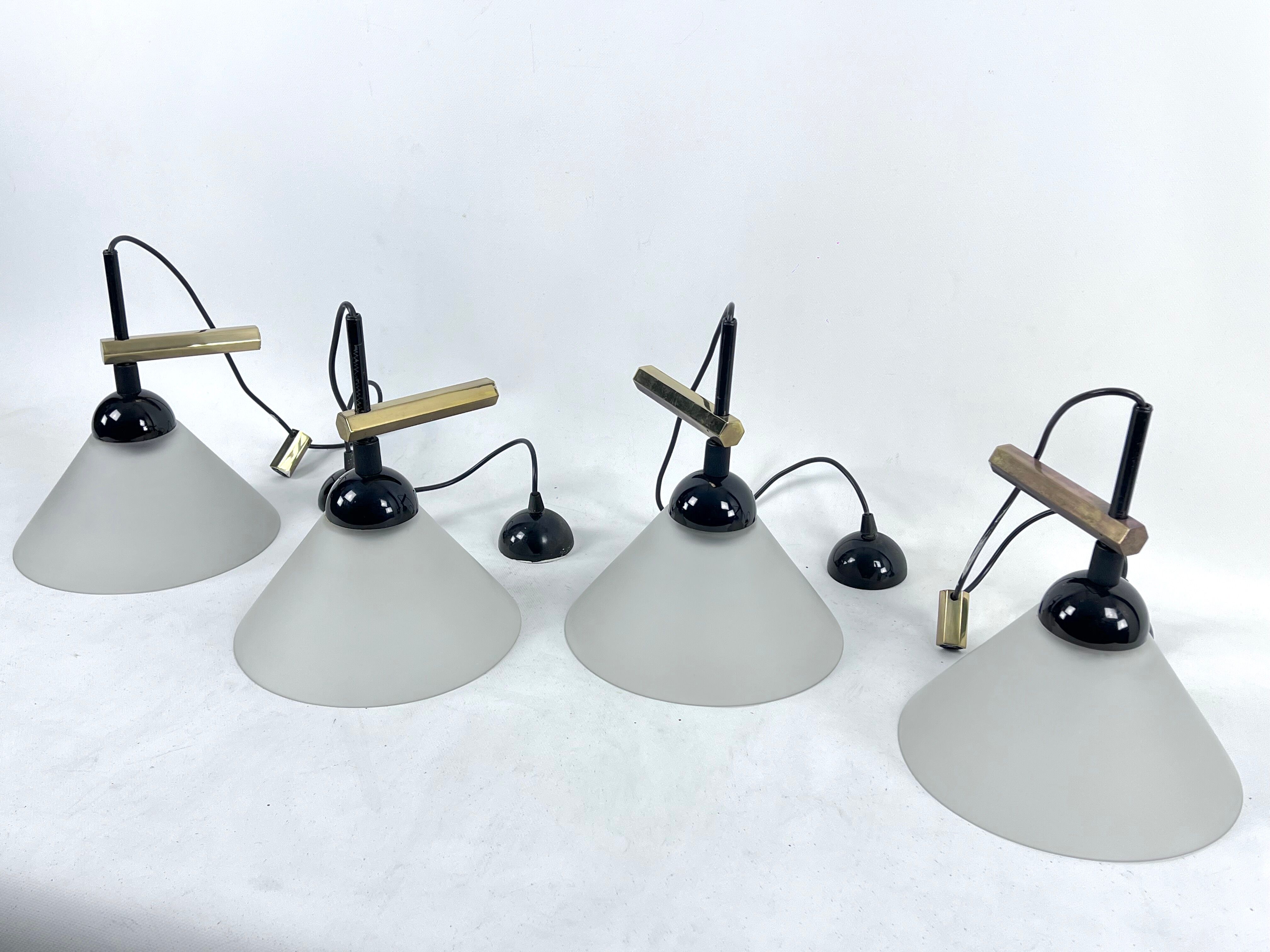 Rare Set of four Italian Modern brass and Murano glass wall lamps by Quattrifolio. 1970s
