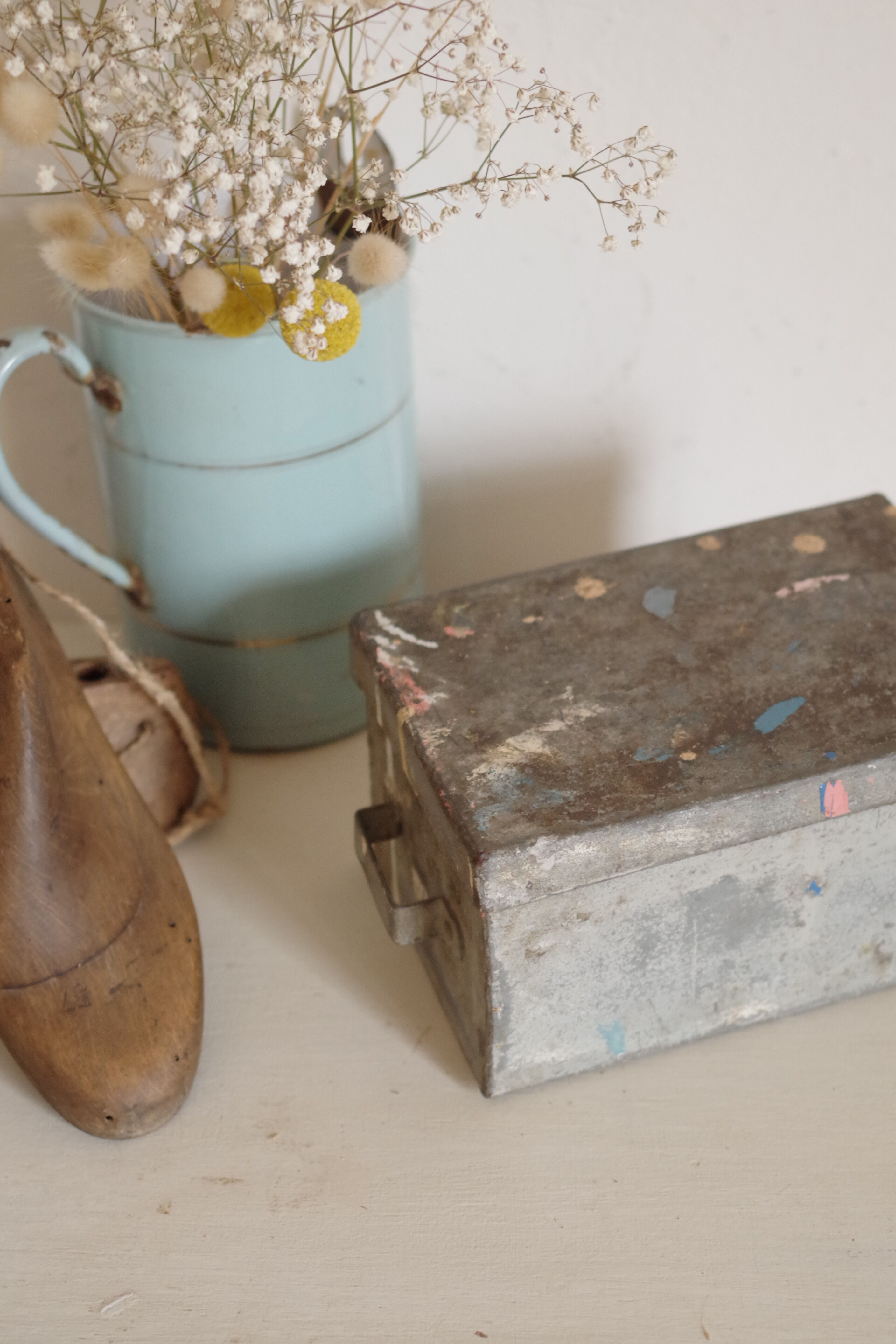 Small old white metal box