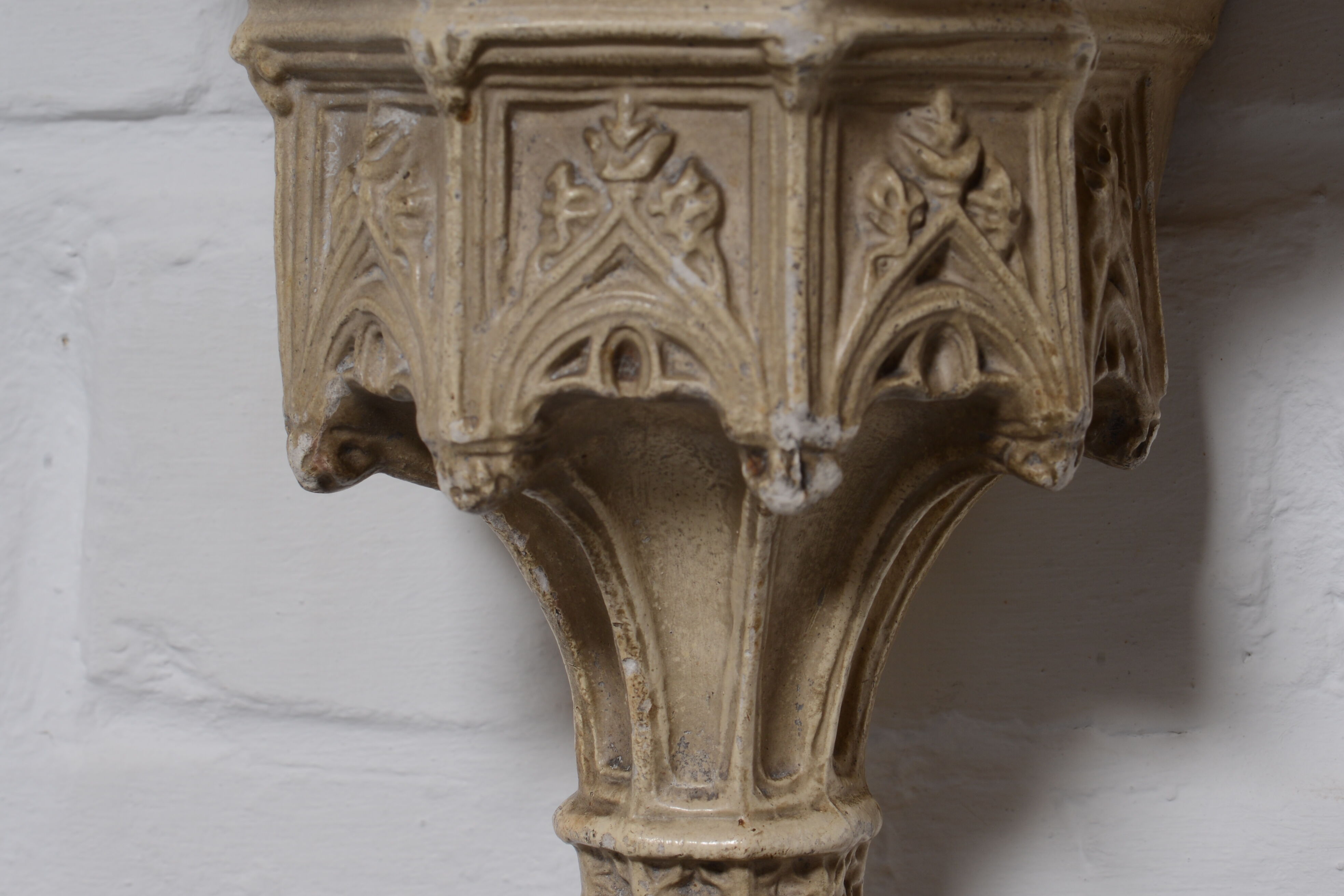 Gothic-style plaster wall console