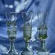 Pair of green glass champagne flutes - spiral