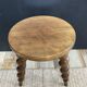 Antique tripod stool made of turned wood