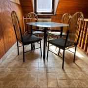 Vintage 1970s dining set in black & brass, wood and glass top - set of 5