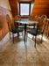 Vintage 1970s dining set in black & brass, wood and glass top - set of 5