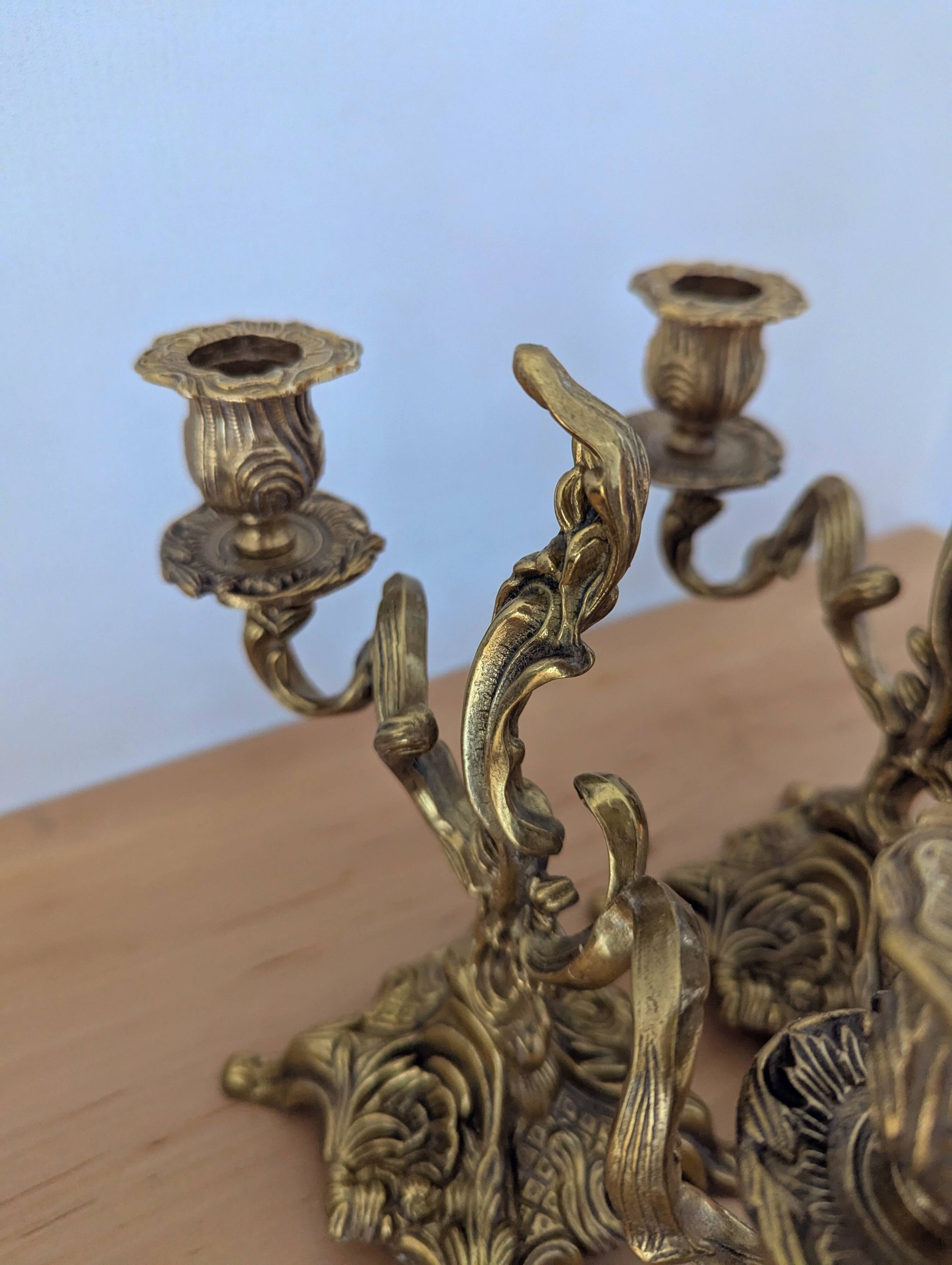 Pair of antique bronze candlesticks in the Louis XV rococo style