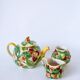 Tea service consisting of a teapot, a milk jug and a numbered hazelnut slip sugar bowl
