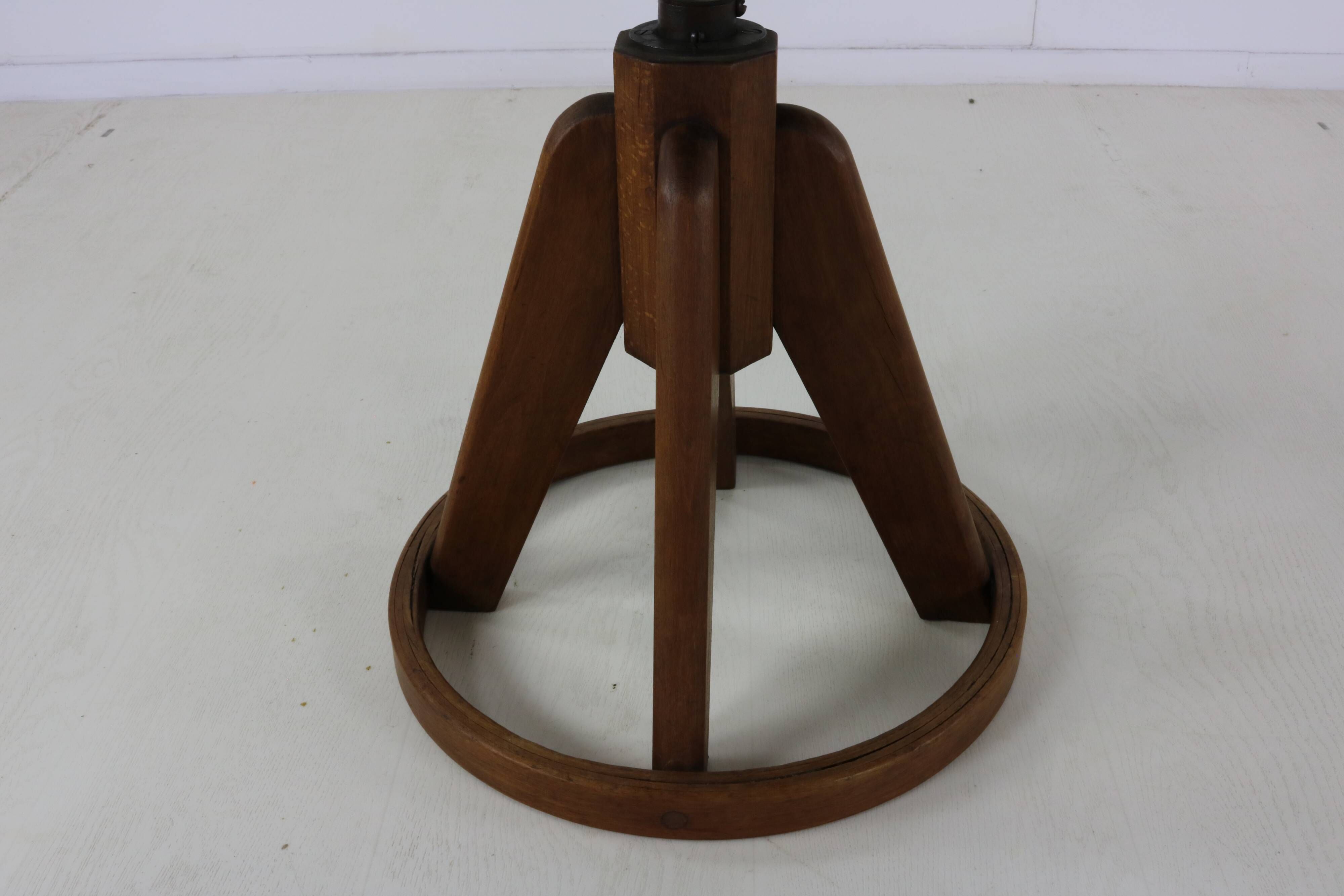 Fifties design working chair with stabilizing wooden ring base