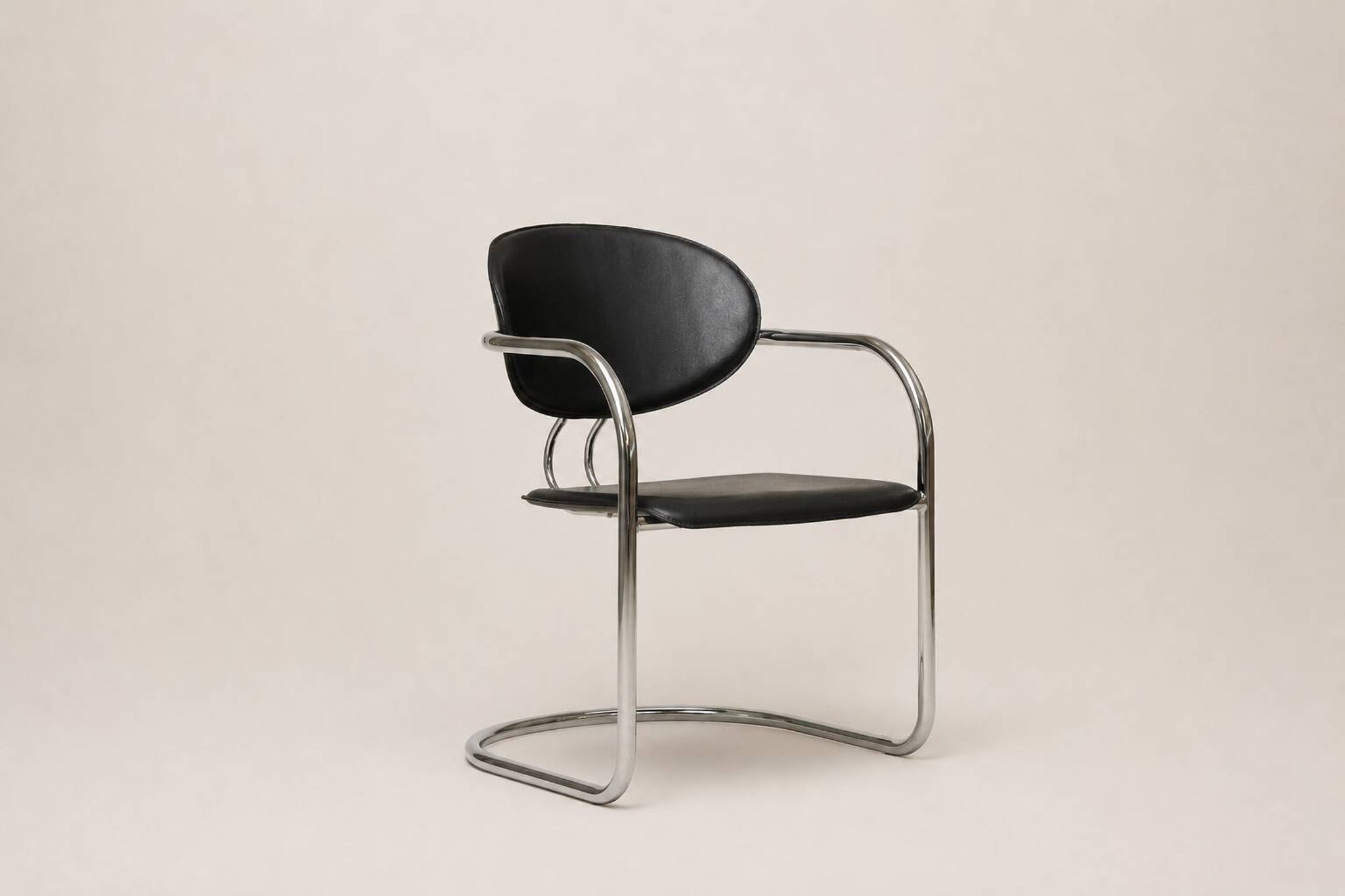 Set of eight cantilever chairs in black faux leather and chrome steel — c. 1980