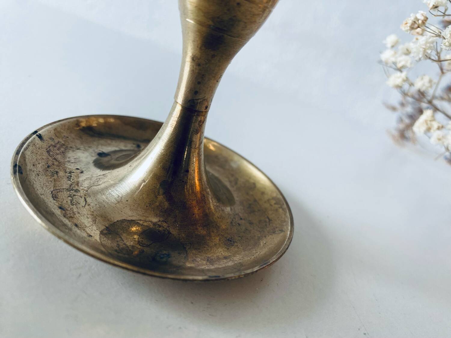 Golden brass candle holder