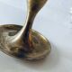 Golden brass candle holder