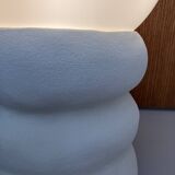 Large table lamp in off-white ceramic with an organic globe shape.