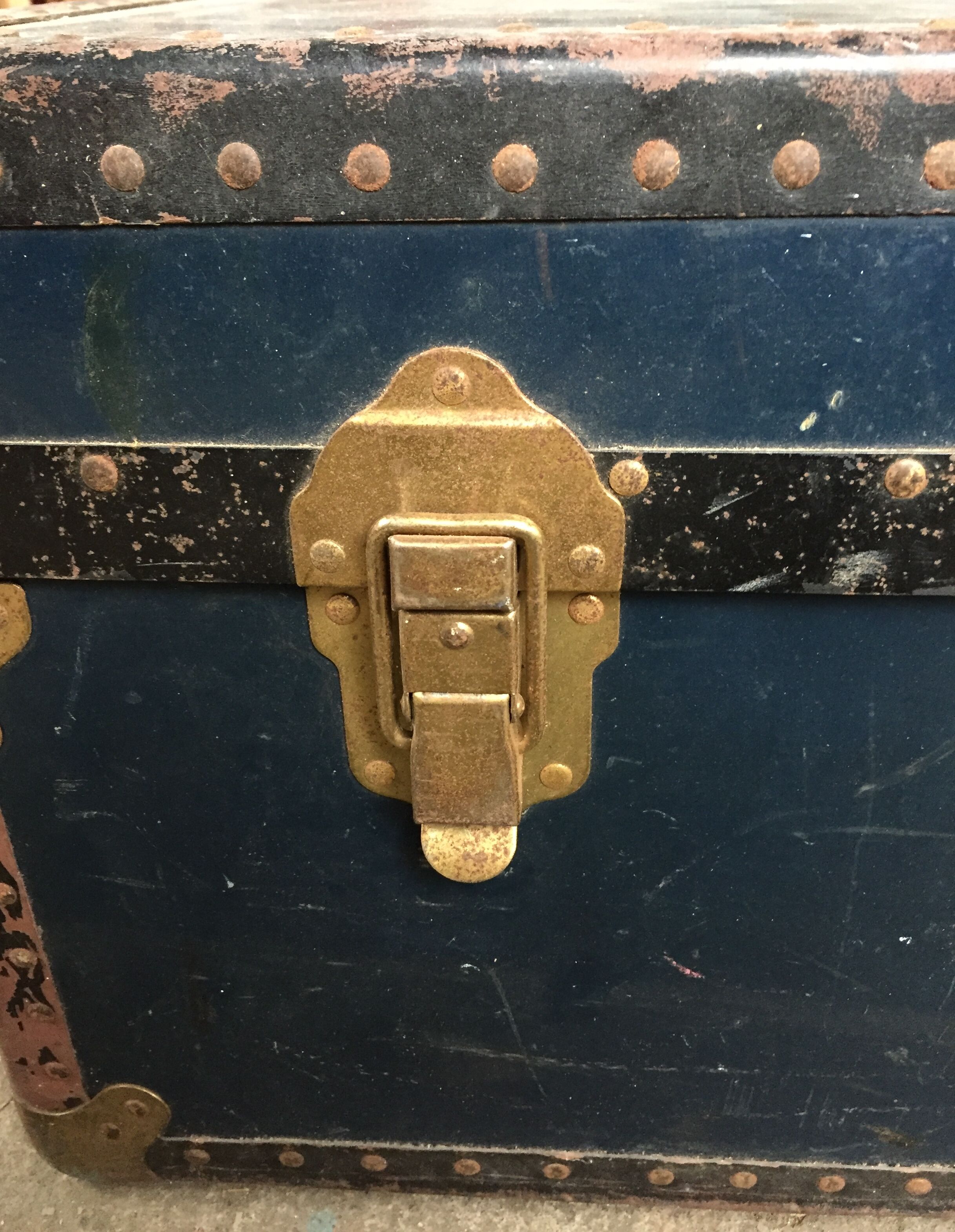 Large blue travel trunk