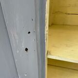 Blue patinated cap cabinet