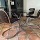 Oval table. 1970. Steel and smoked glass. 180x100