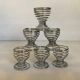 Six spiral spring egg cups