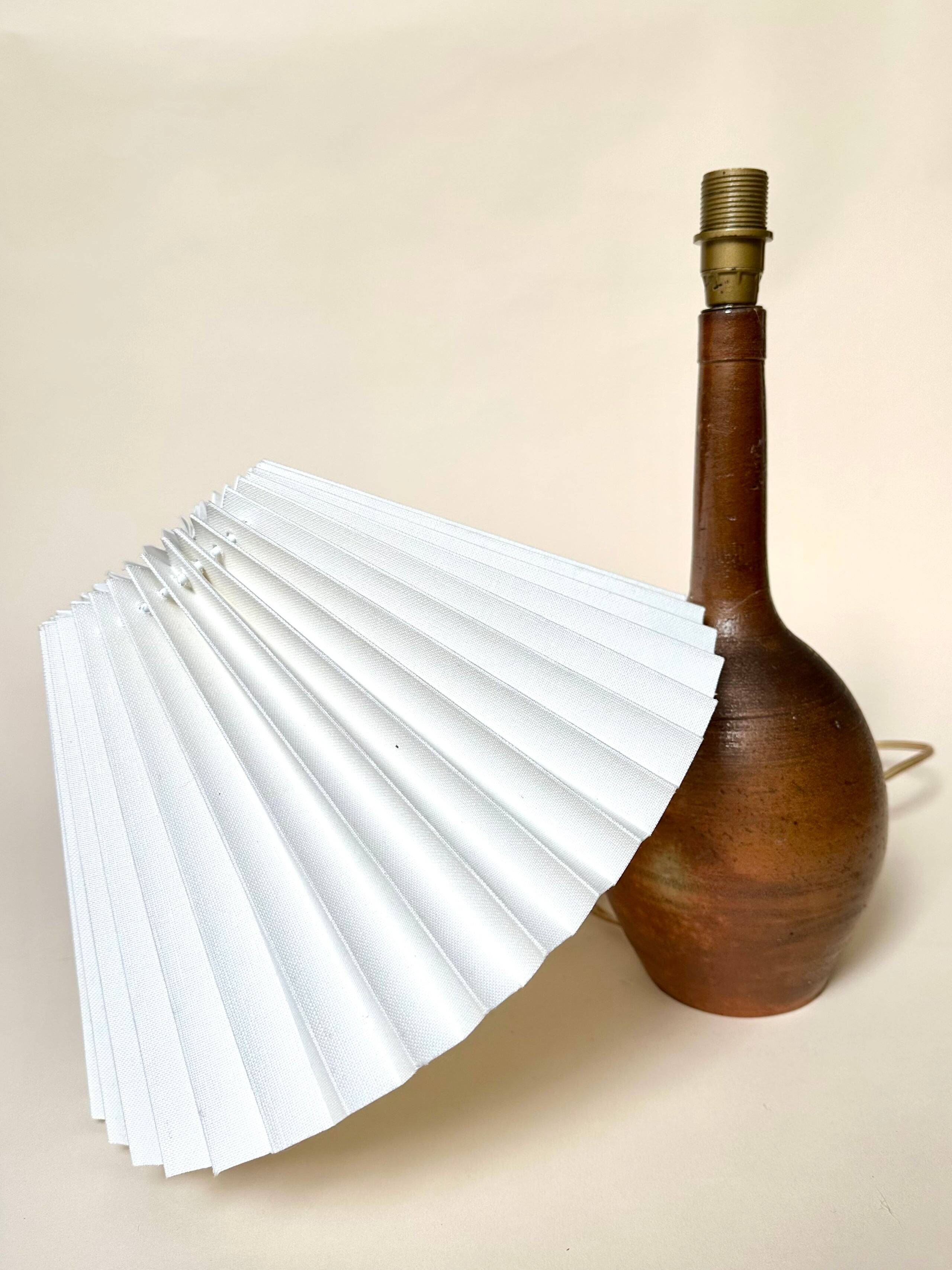 Stone lamp with pleated shade