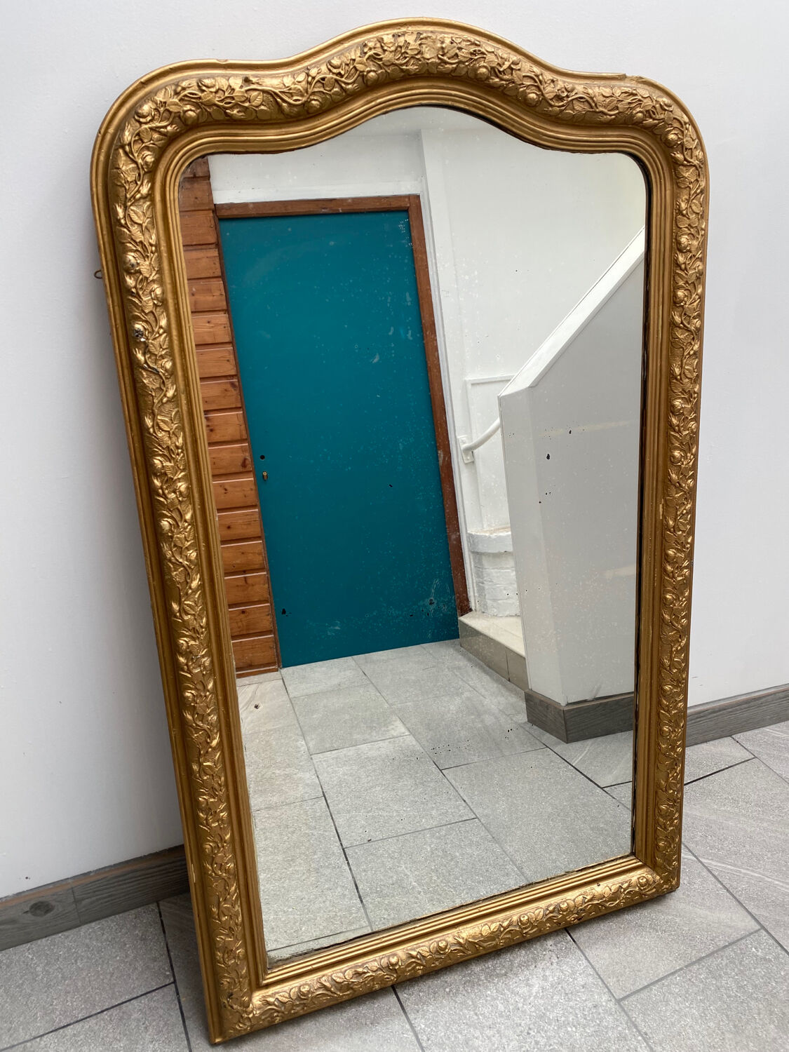 Large gilded patinated trumeau mirror