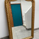 Large gilded patinated trumeau mirror
