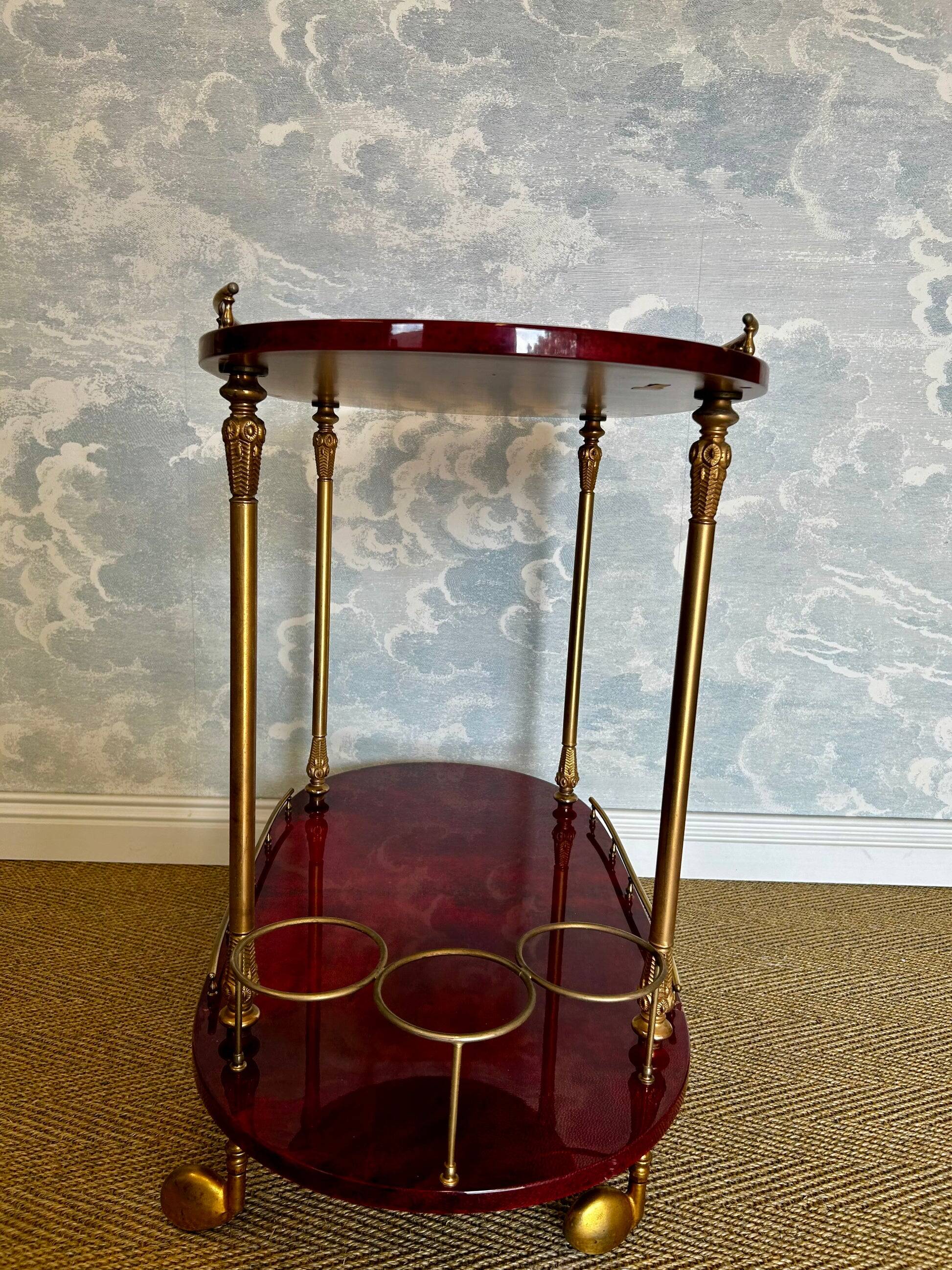 Cherry-red bar cart by Aldo Tura, Italy, 1960s, Hollywood Regency