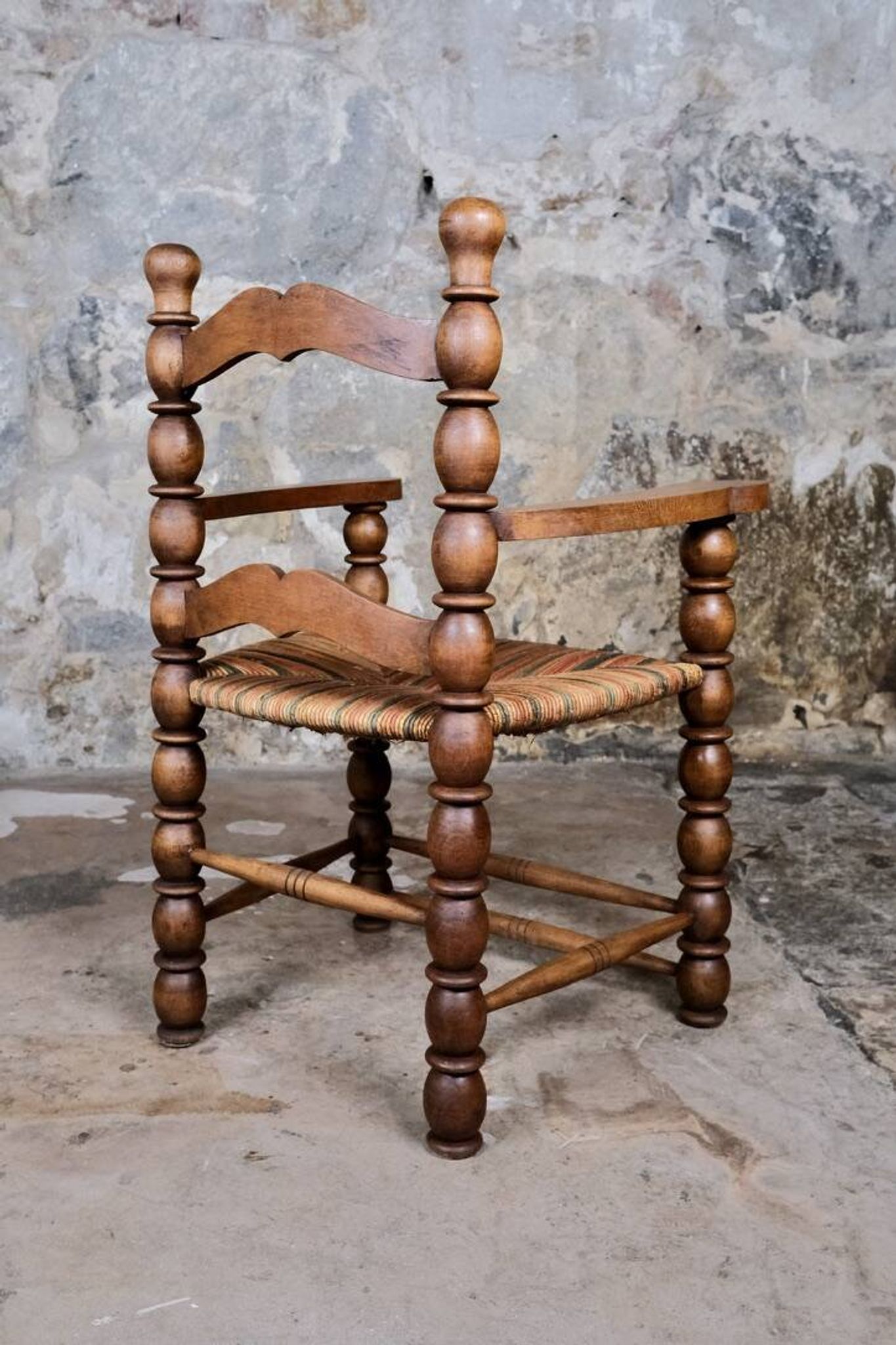 Pair of turned wooden spool armchairs, mid-20th century, France