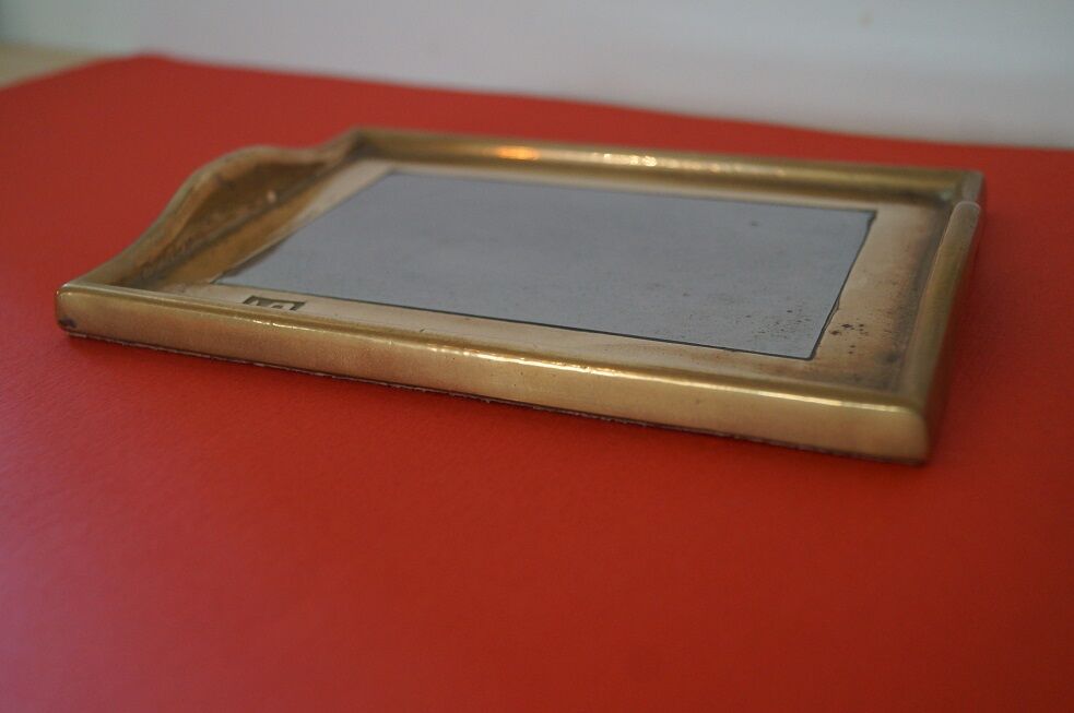 Empty bronze pocket by David Marshall 1970