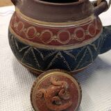 Old terracotta teapot