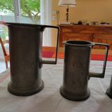 7 old pewter measures