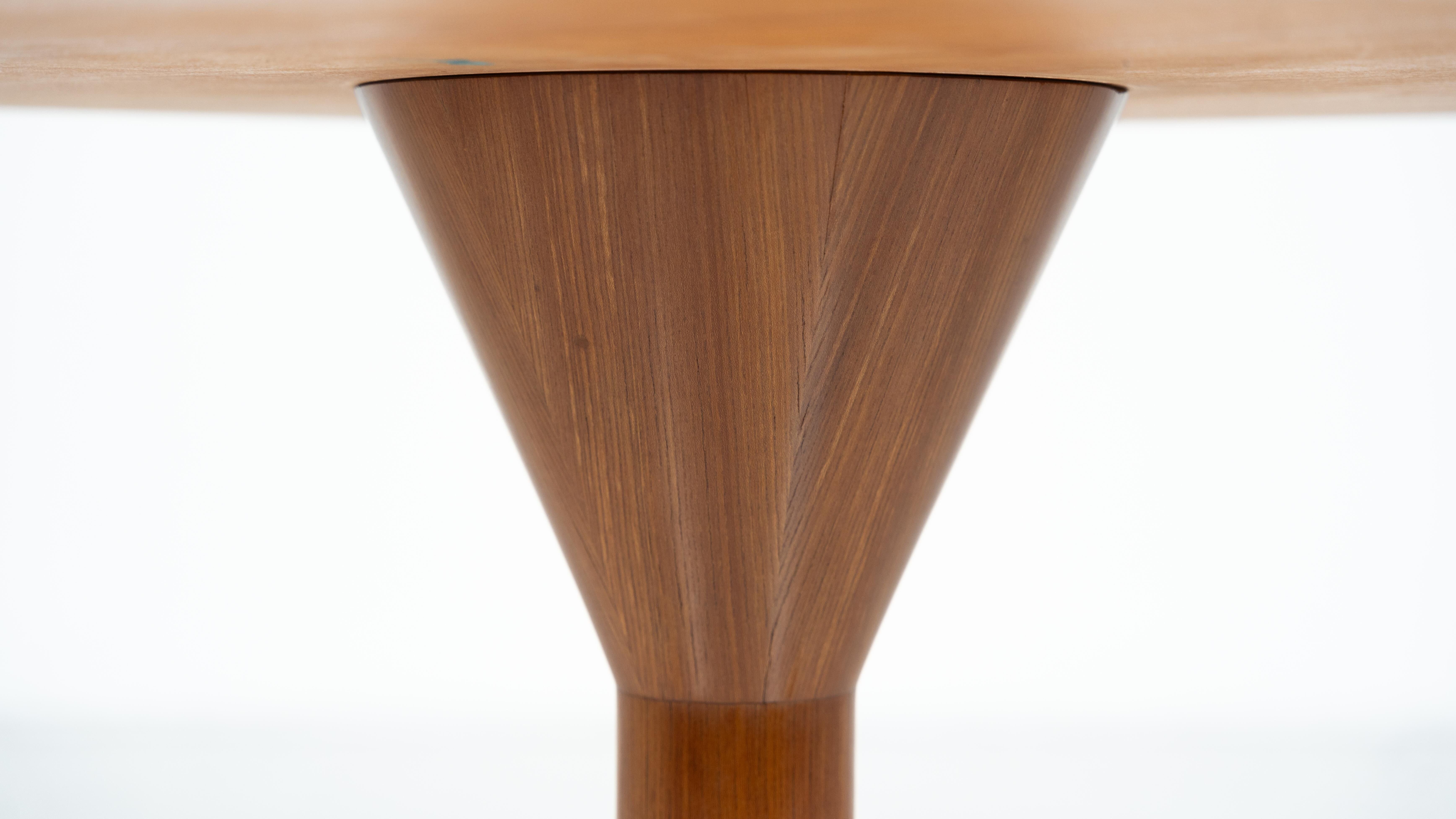 Dining table by Melchiorre Bega, brass and wood, Italy, 1950s.