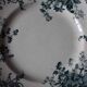 A set of 4 flat plates Terre de fer mismatched blue
