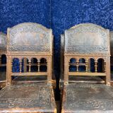 Set of 8 Renaissance style chairs in walnut and embossed leather