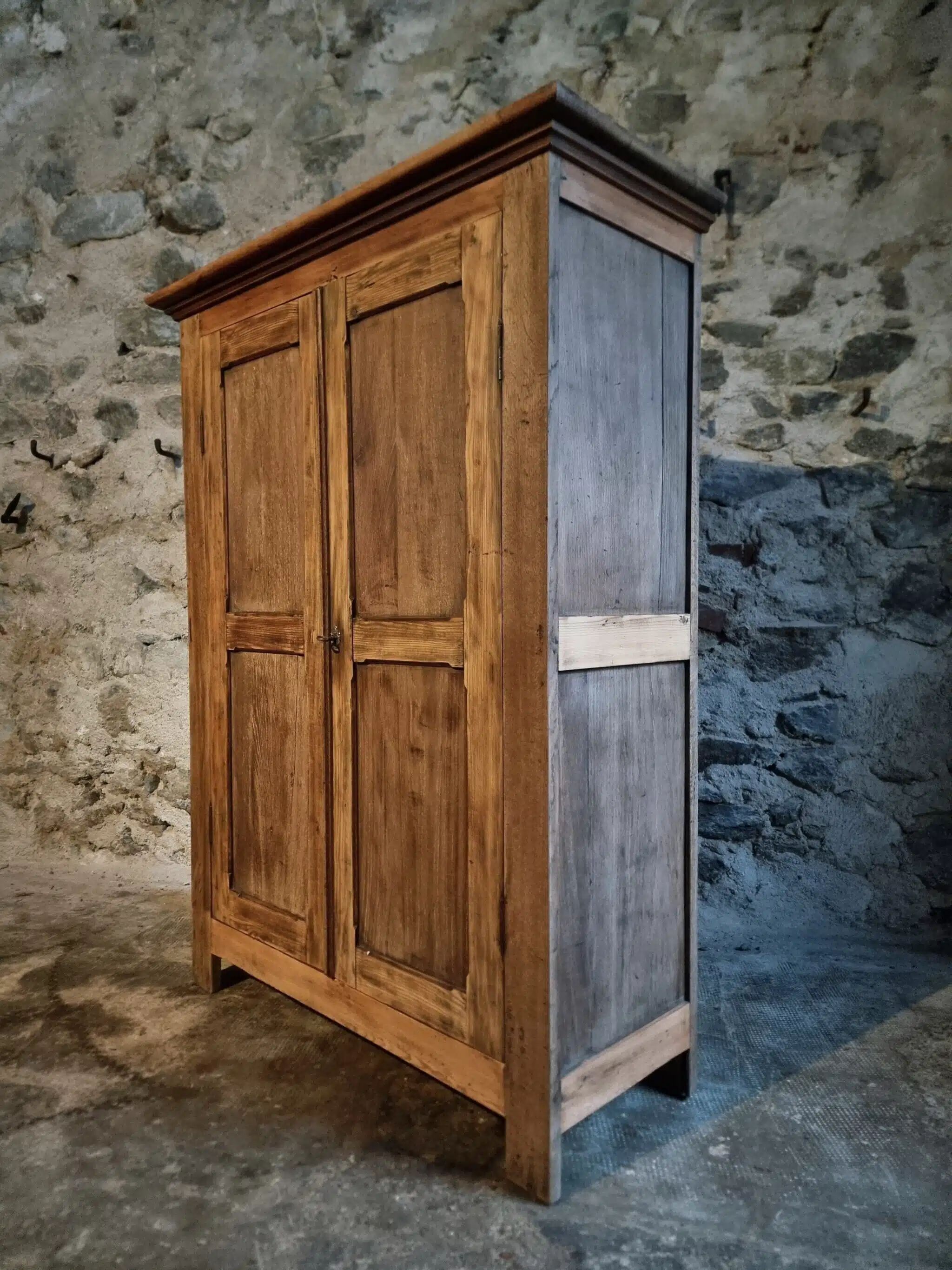 Antique French wardrobe in oak and pine, late 19th century.