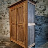 Antique French wardrobe in oak and pine, late 19th century.