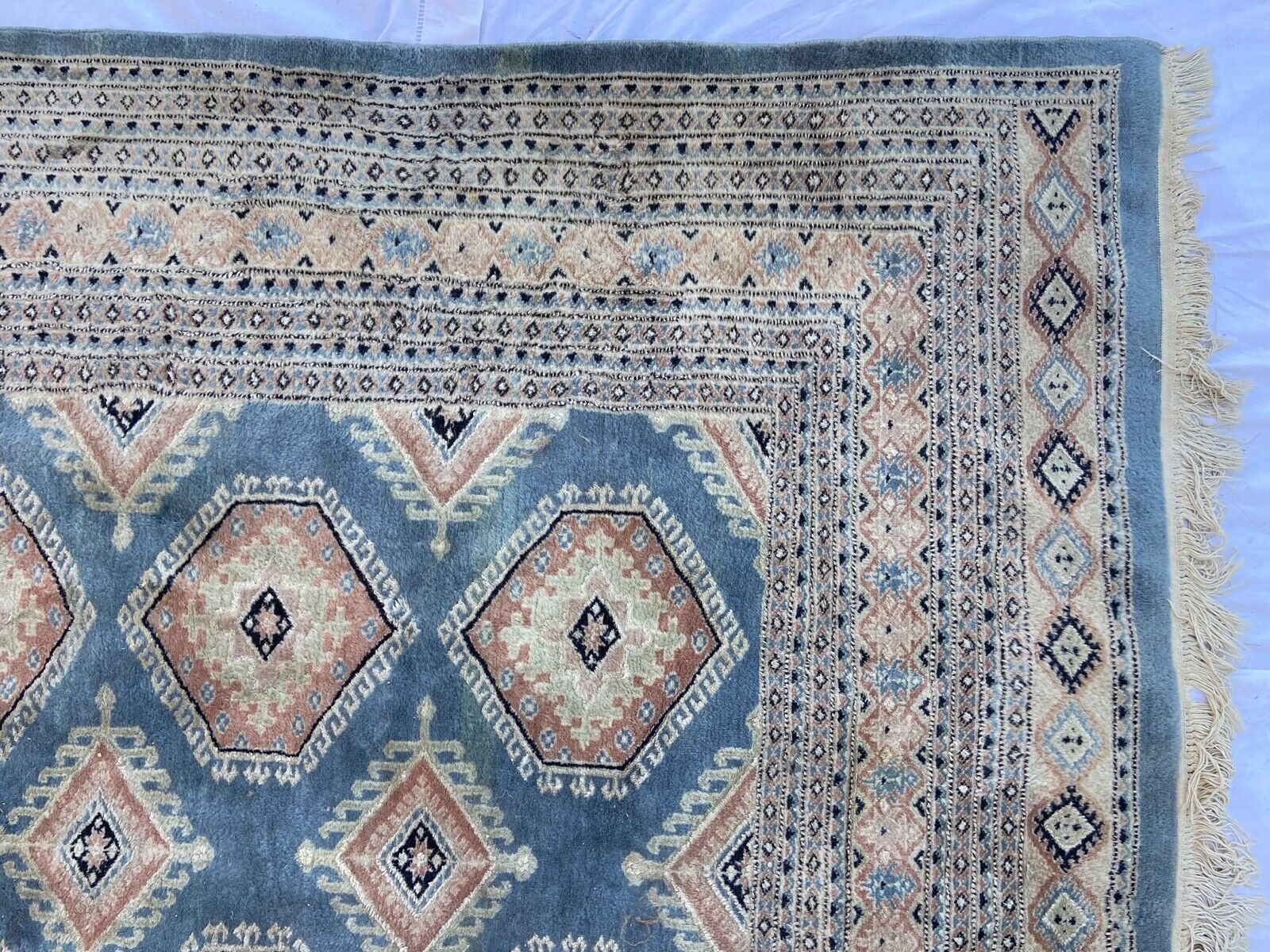 Tapis oriental fait main xxeme fond bleu 307 cm x 222 cm